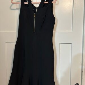 Black sleeveless midi form fitting dress from Italy.